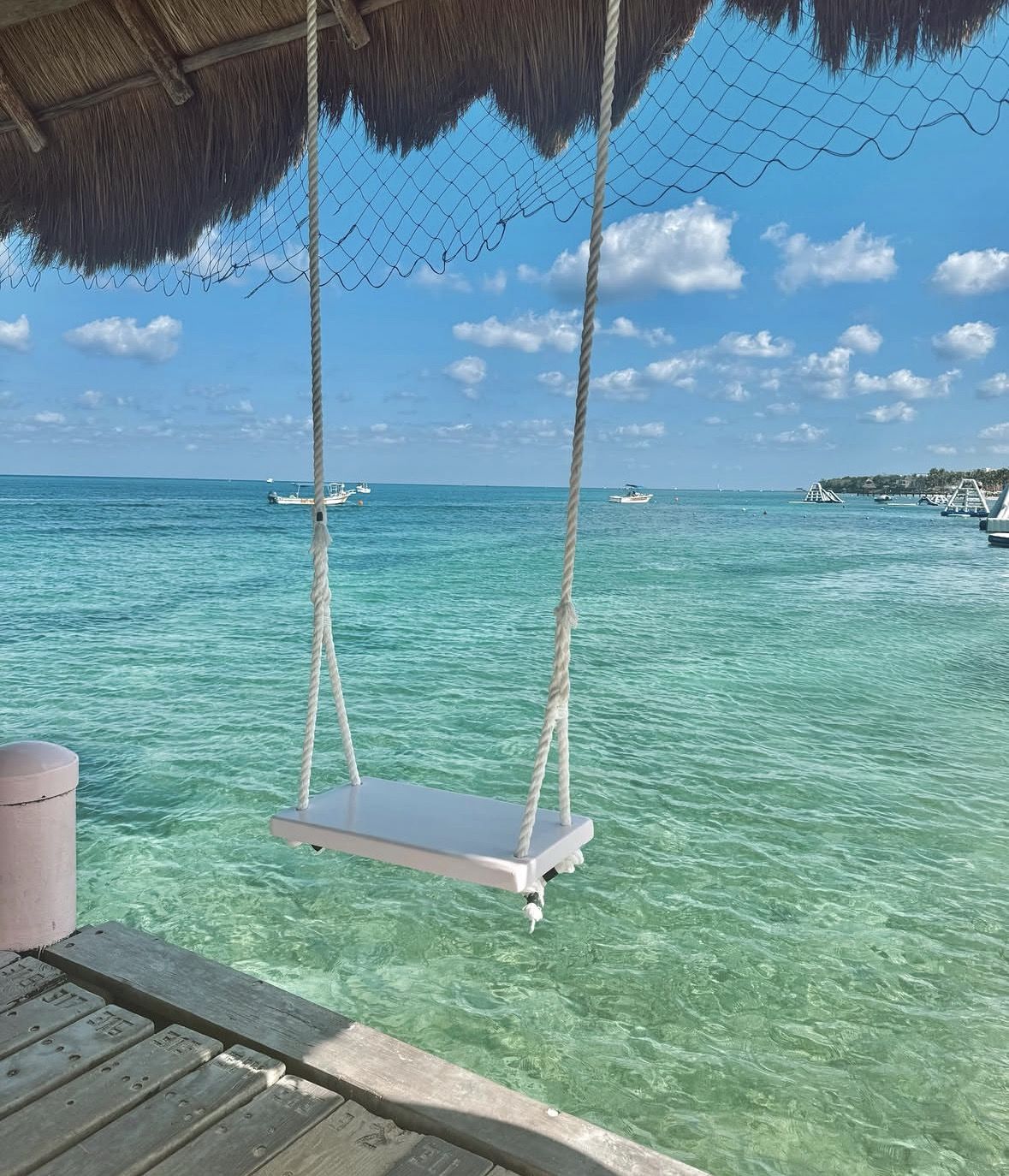 Diving and snorkeling gear laid out on a tropical beach ready for a reef tour